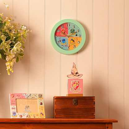 HARRY POTTER CHARMS WALL CLOCK - HOUSE CRESTS